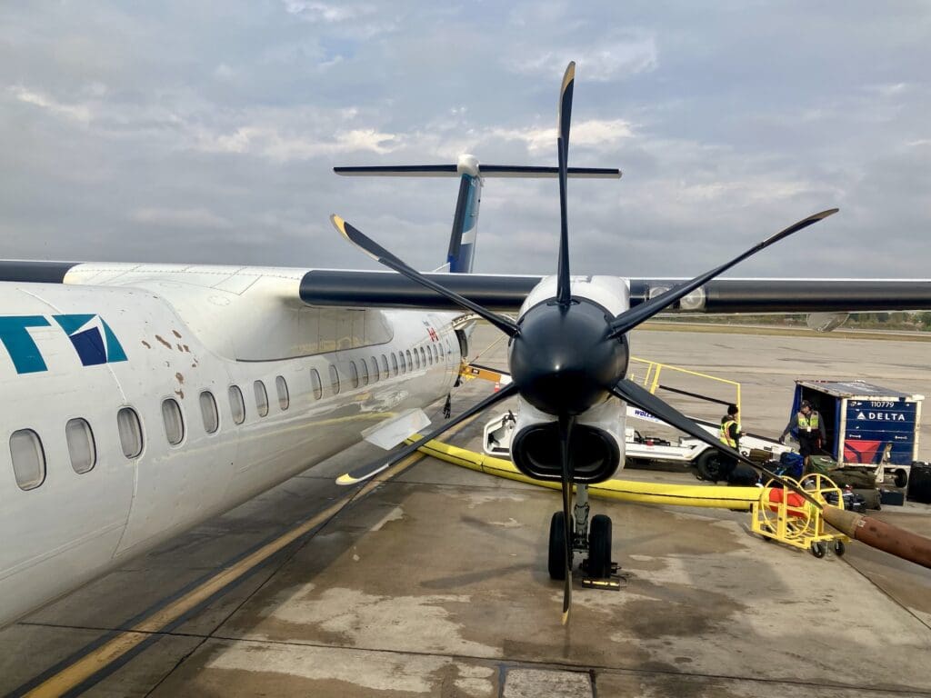 WestJet Encore Dash 8 Q400 from the Jet Bridge