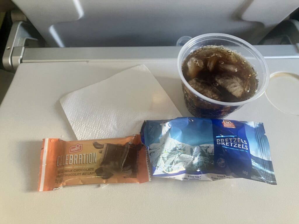 Diet Coke, Cookies, and Pretzels - WestJet Encore Food and Beverage Service