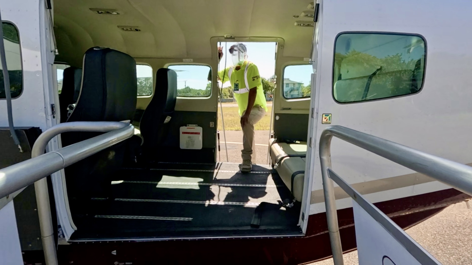 Boarding a Tropic Air Cessna in Caye Caulker
