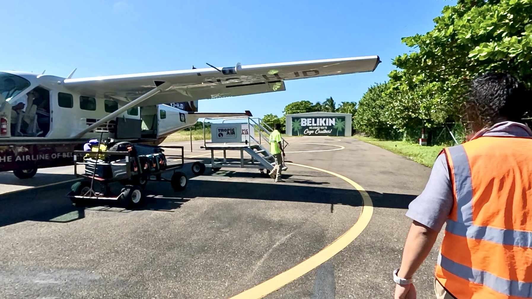 Luggage Being Loaded Onto a Tropic Air Flight