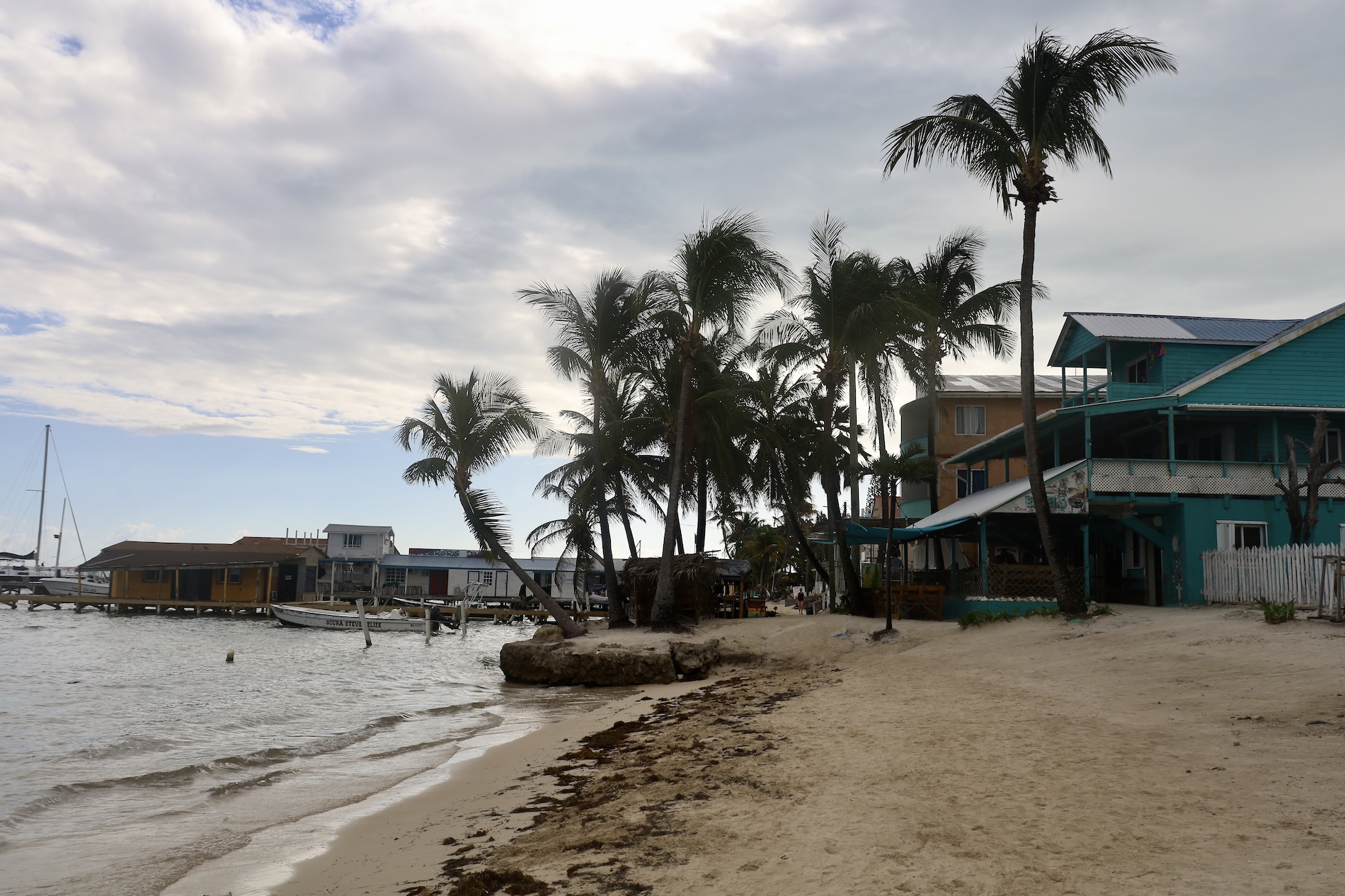Walking the Shoreline of Ambergris Caye Towards the Ferry Dock