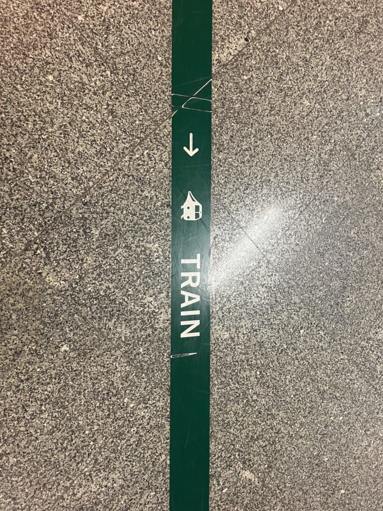Green Arrows to the Train at Chopin Airport