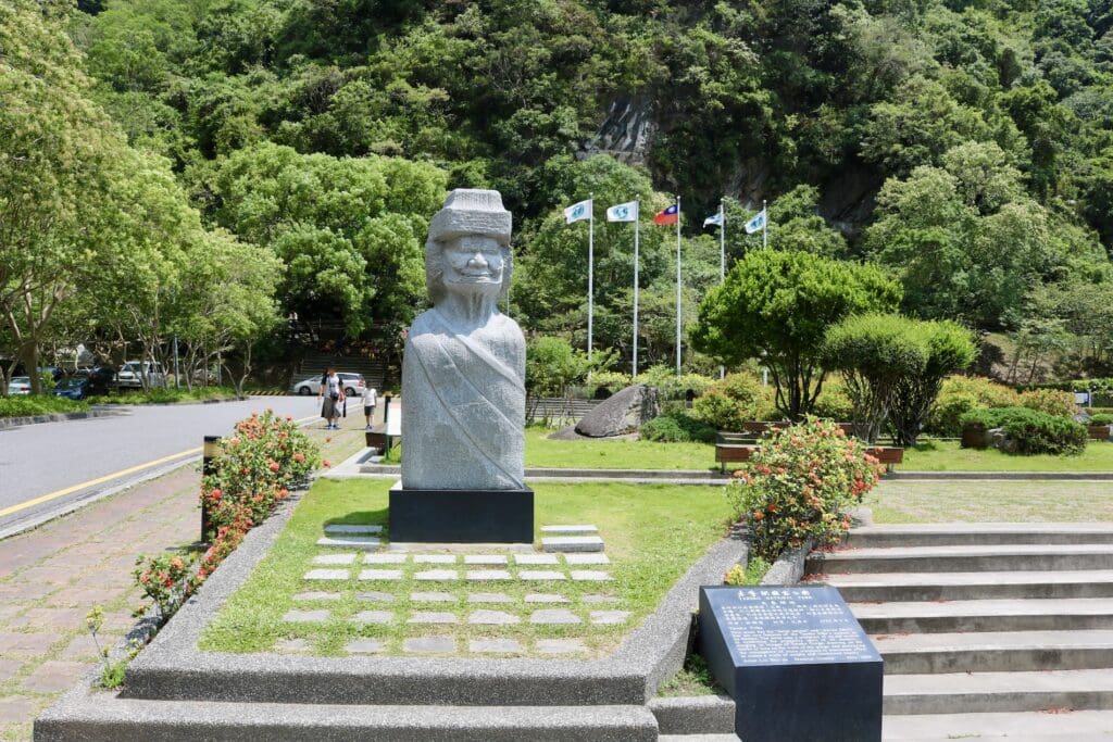 Flags and a Statue Near the Entrance to Taroko National Park