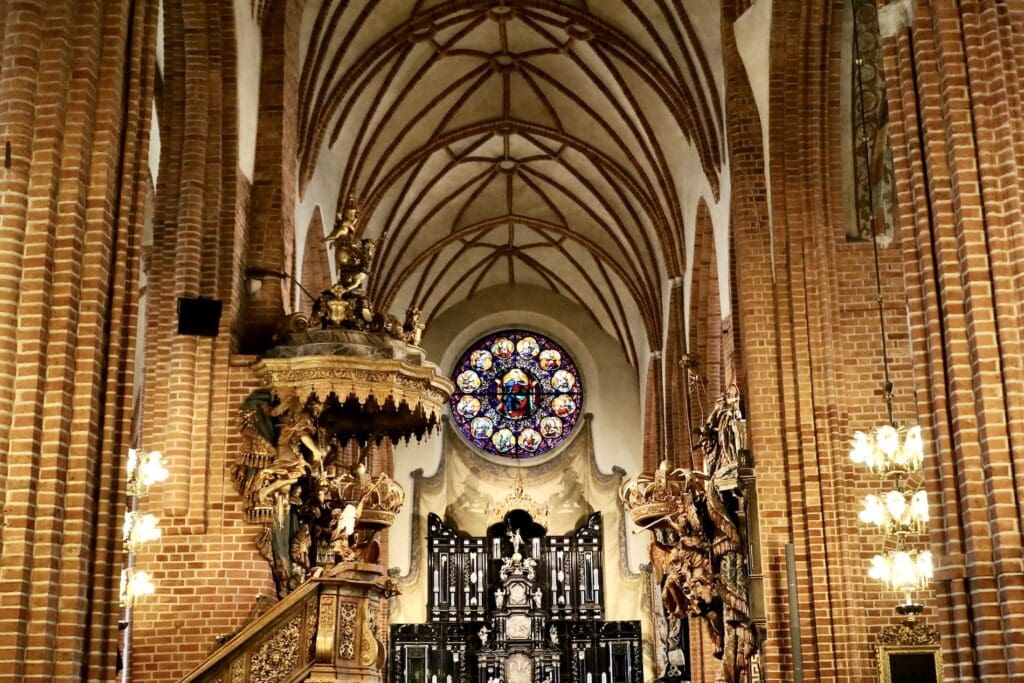 Brick Arches and Stained-Glass Windows Inside Storkyrkan