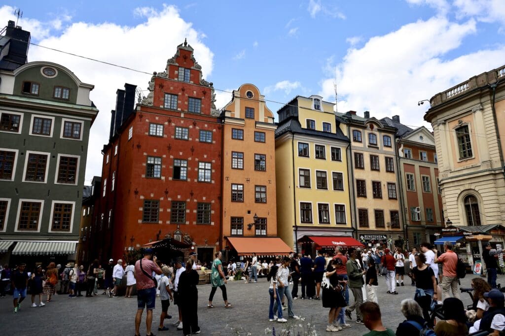 Colorful Buildings and Crowds at Stortorget in Gamla Stan