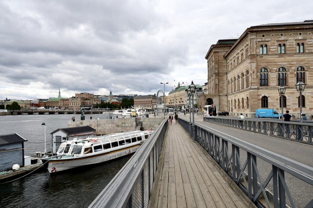 Walking Across Skeppsholmsbron Bridge toward Stockholm’s Nationalmuseum